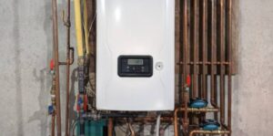 Tankless water heater system installed with copper piping – Water Heater Maintenance Tips