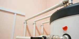 Modern plumbing system installation with Tankless Water Heaters and connected water supply lines