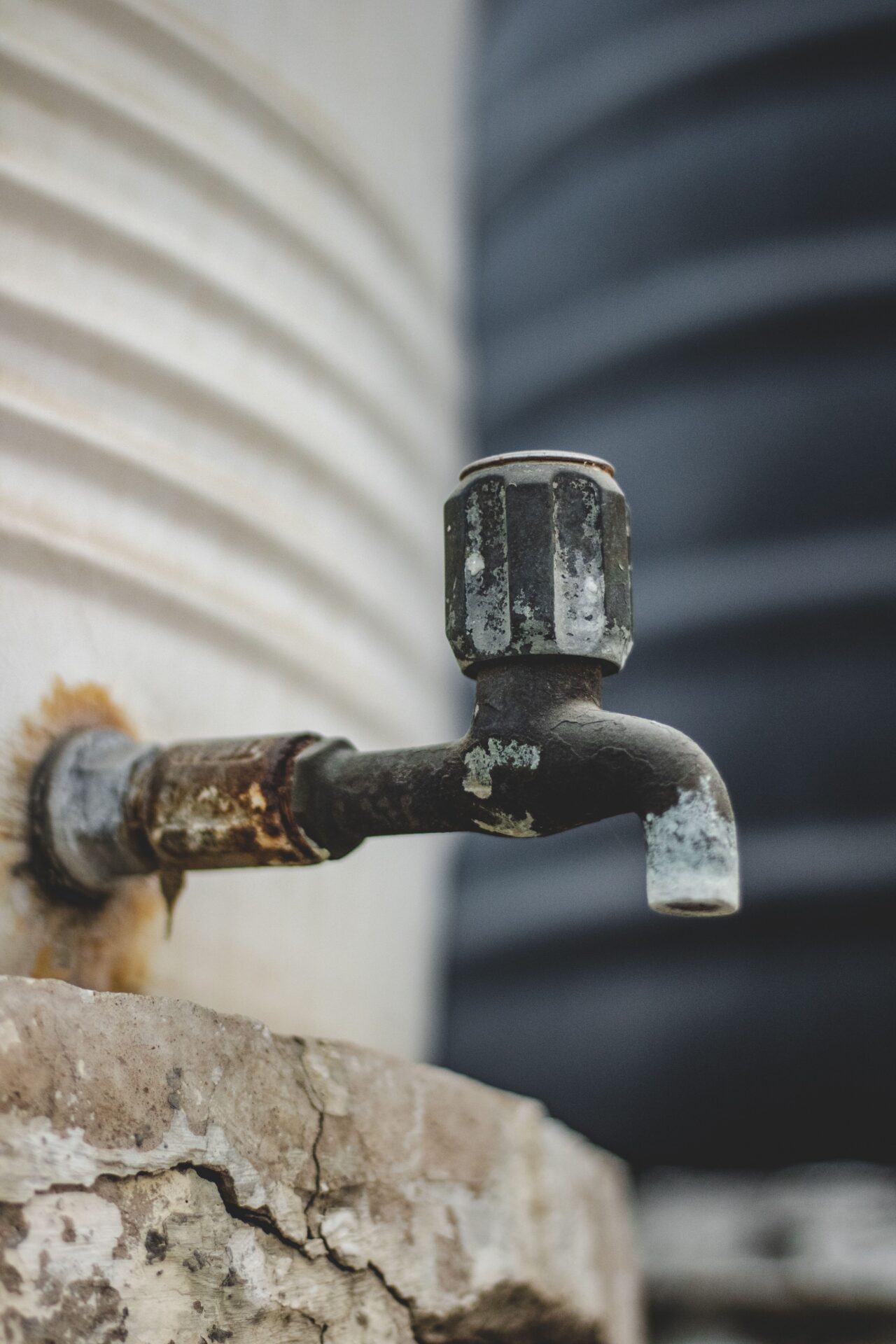 Corroded outdoor faucet with rust and mineral buildup showing signs of poor water quality in Knoxville