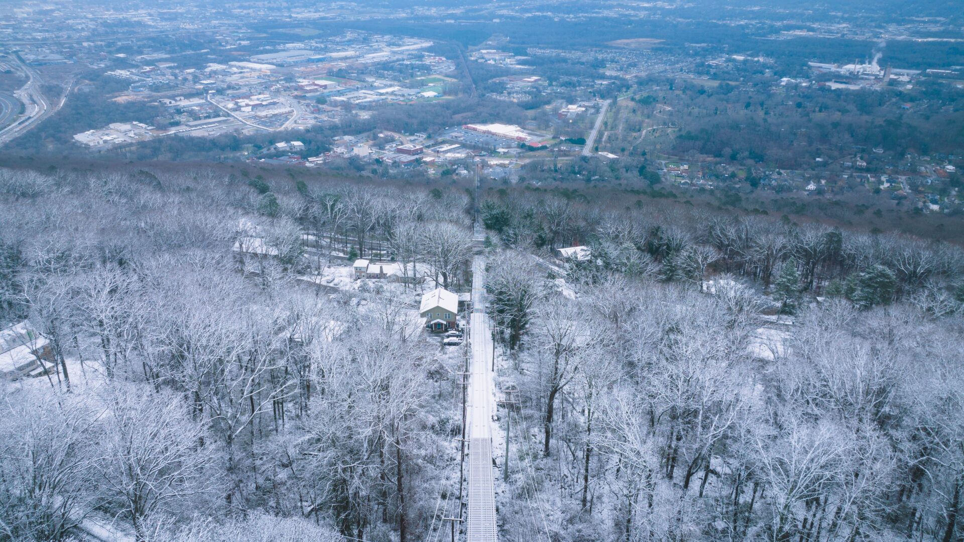 Aerial view of an East Tennessee town and frost-covered trees during a winter cold snap